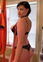 sexy brunette girlfriend posing in lingerie
